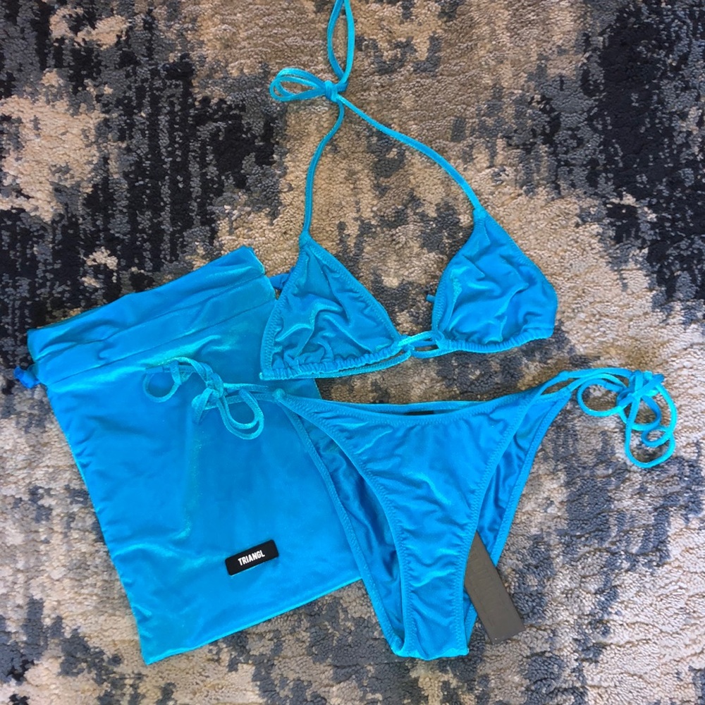 Brand new! String bottoms and string top swimsuit set bag.